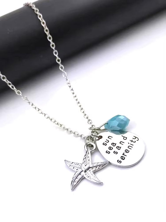 Sun Sea Sand Serenity Necklace – Beach-Inspired Silver Pendant with Starfish & Blue Bead