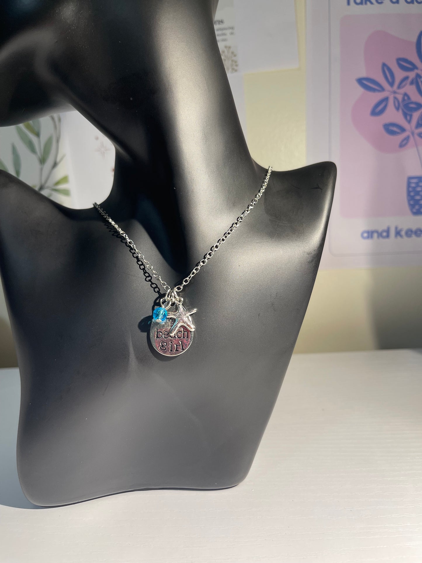 Beach Girl Necklace – Silver Pendant with Starfish & Blue Crystal Charm