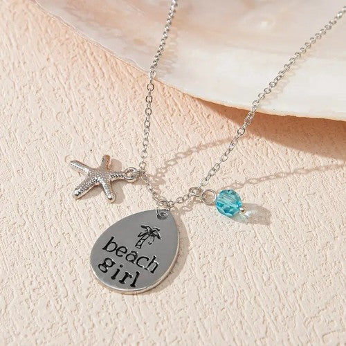 Beach Girl Necklace – Silver Pendant with Starfish & Blue Crystal Charm