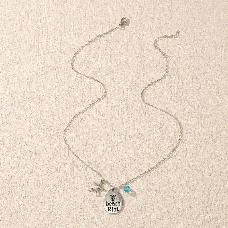 Beach Girl Necklace – Silver Pendant with Starfish & Blue Crystal Charm